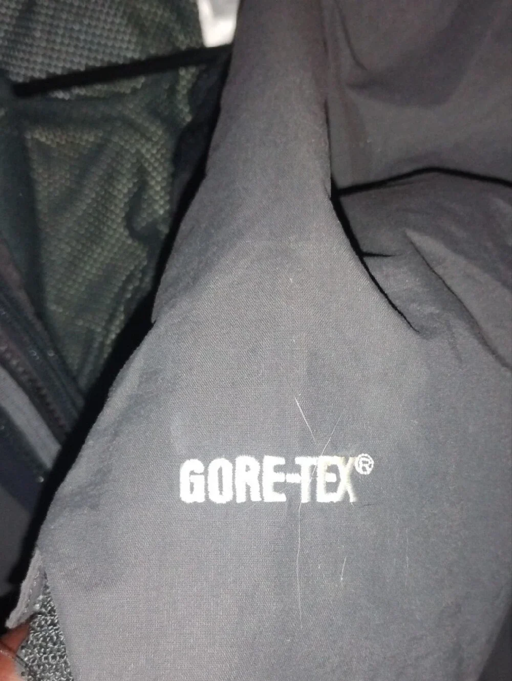 The North Face Men’s Gray and Black Raincoat